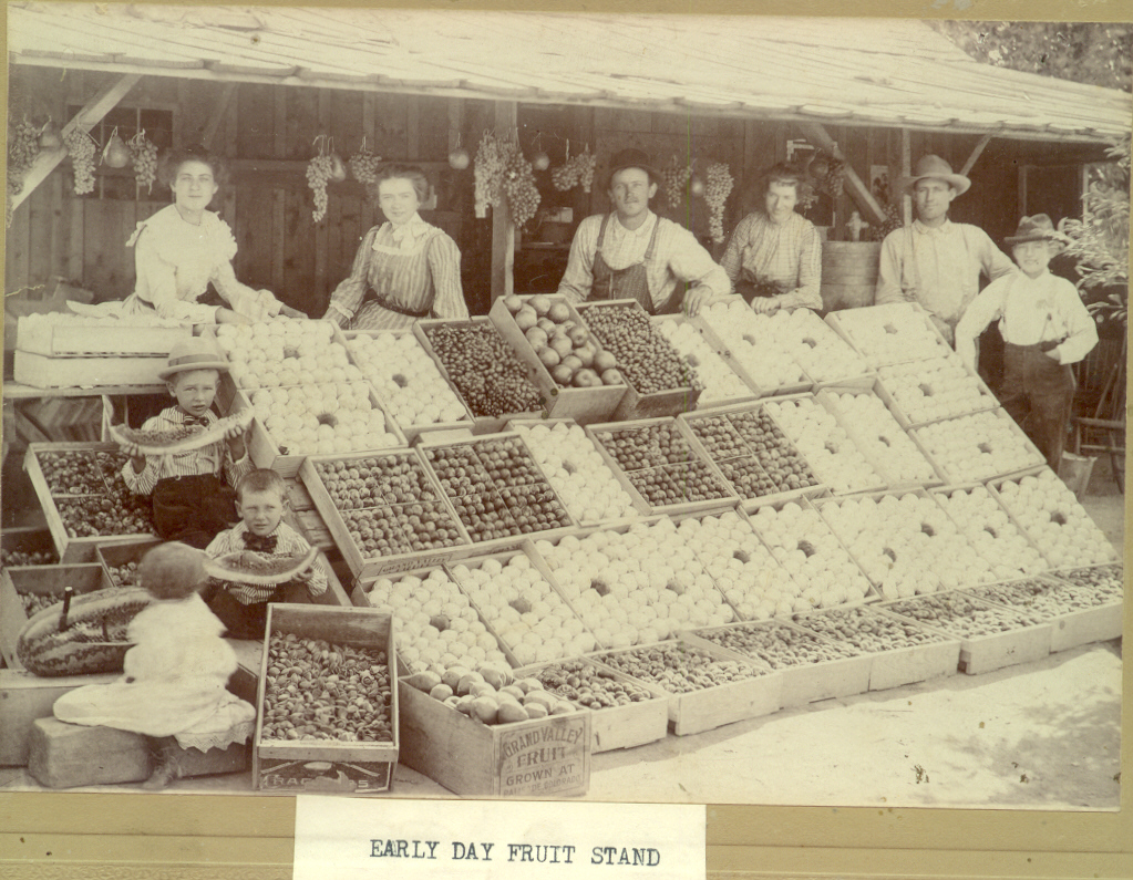 An early 1900s fruit stand with a variety of fruits and display boxes. Photo # 1979.0023 #082, Museums of Western Colorado.