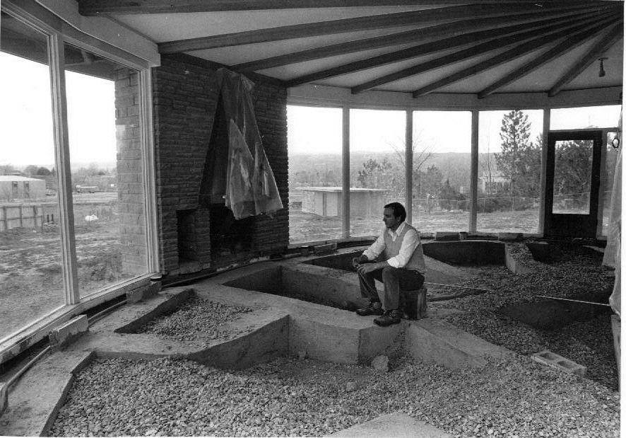 Yves Gallet sits in his Grand Junction living room after uranium tailings had been removed in 1988. Photo # 2004.0044.0151, Museums of Western Colorado.